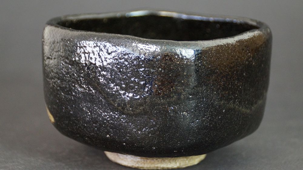 Additional side view of the chawan made of Raku ware with black glaze