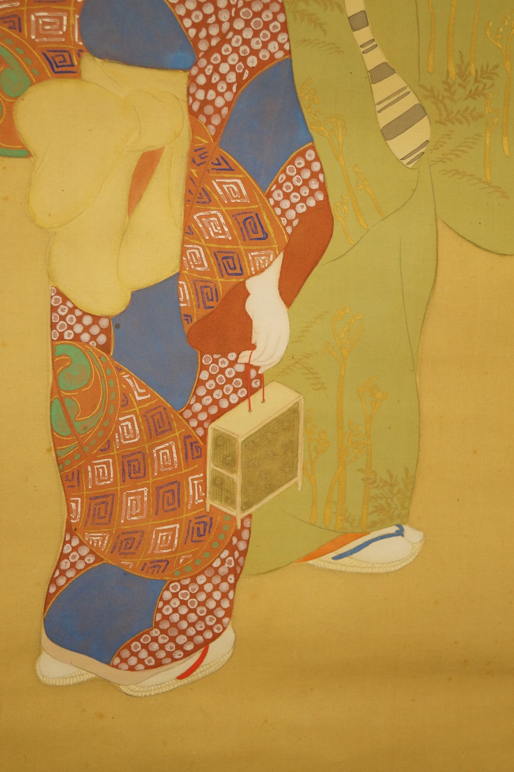 Daughter in Patterned Kimono with Small Box on Red Cord Figure Motif Close-Up 2