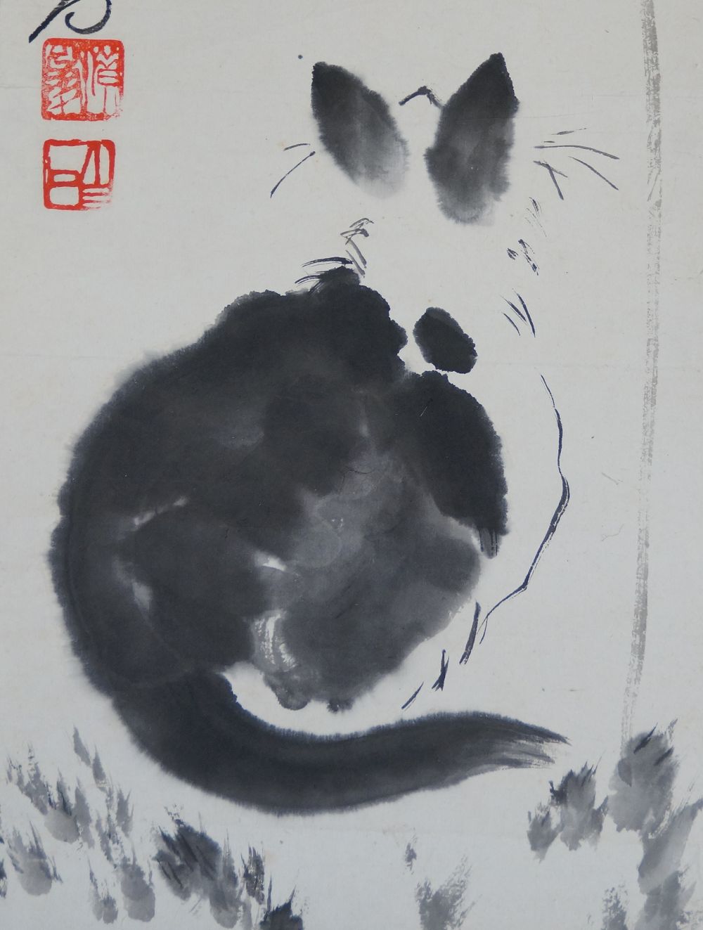 Further detail view of the black cat's ears with artist's signature and red seal