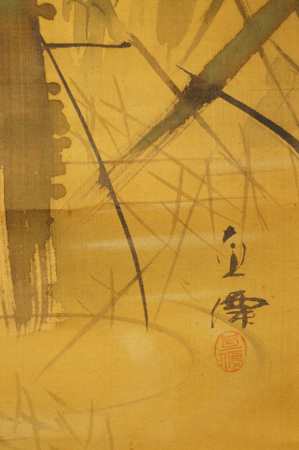 Artist's signature and red seal between reed stalks Signature and Seal Close-up