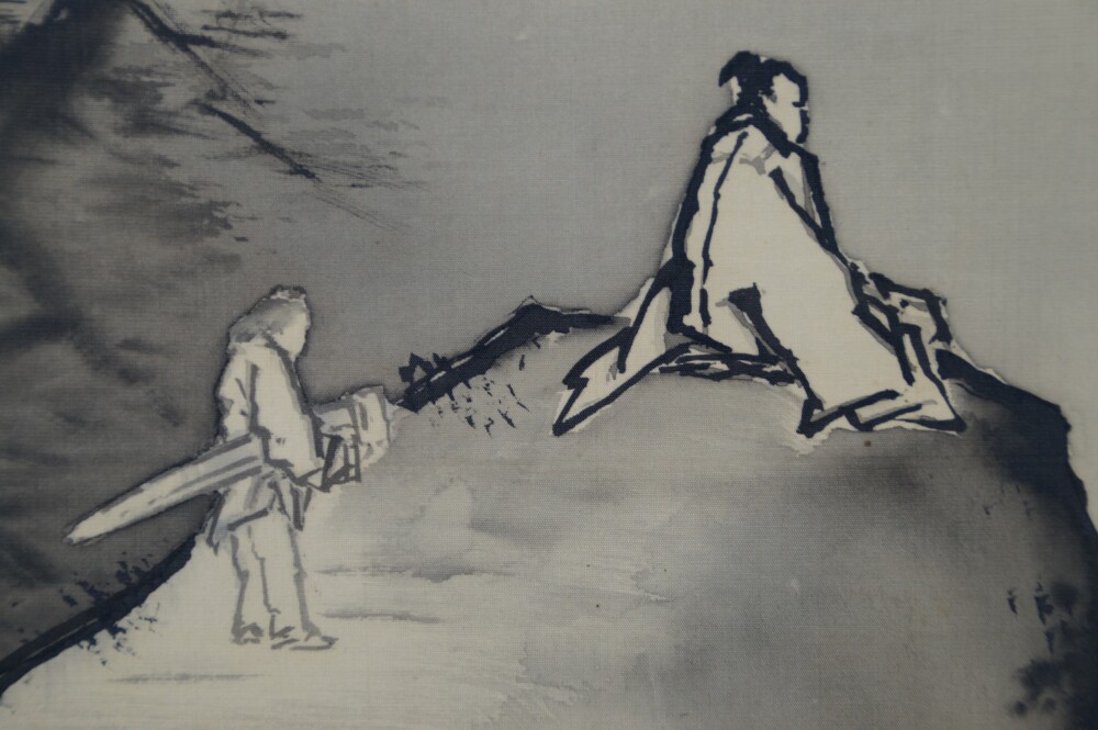 Close-up of the seated scholar and the servant with sword on the rocky ledge in the kakemono Encounter at the Edge of the Waterfall by Yagioka Shunzan