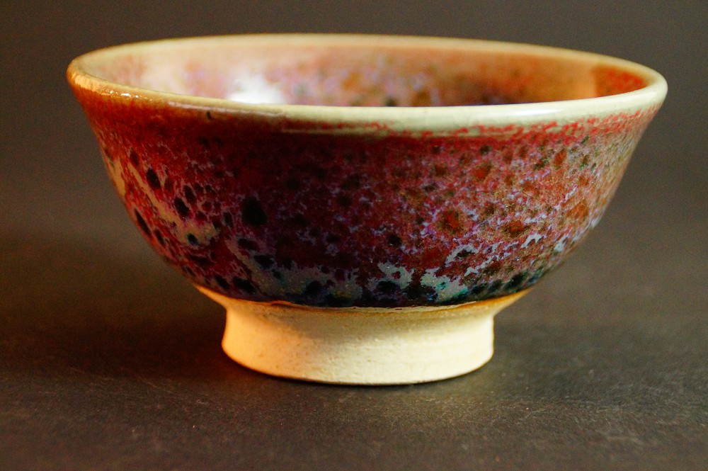 Further side view of the chawan with colorfully speckled glaze by Yamaoka Sanshu
