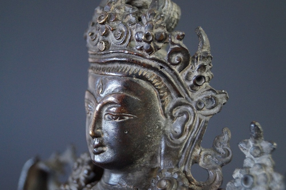 Nepalese Buddha figure made of bronze motif close-up 2