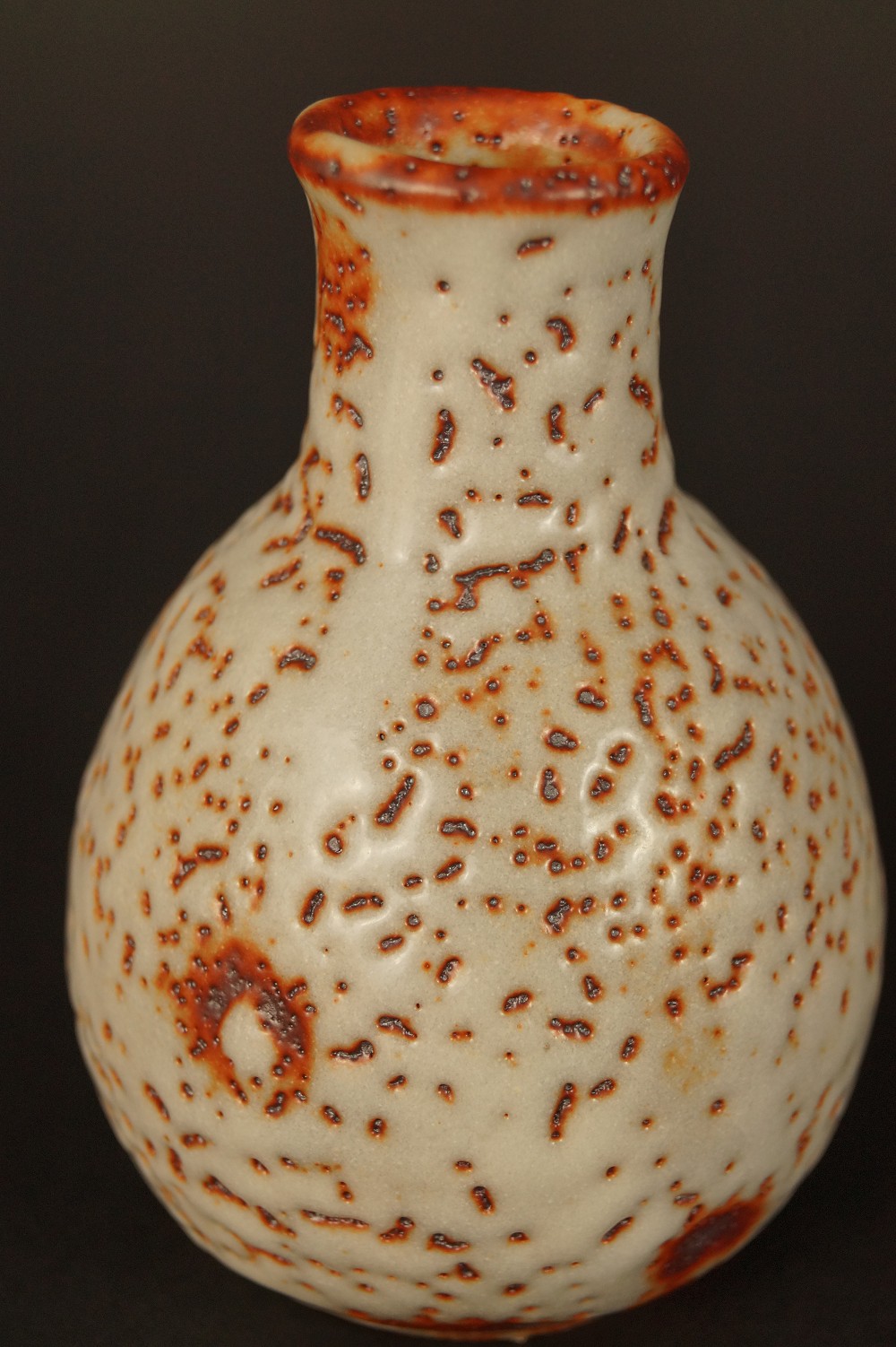 Shino Tokkuri from the side with iron spots Tokkuri Side View