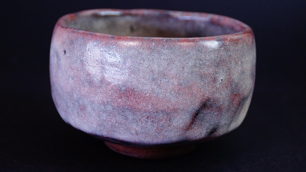 Another side view of the chawan made of Ohi ware with gray-purple glaze by Kaihatsu Bunmei