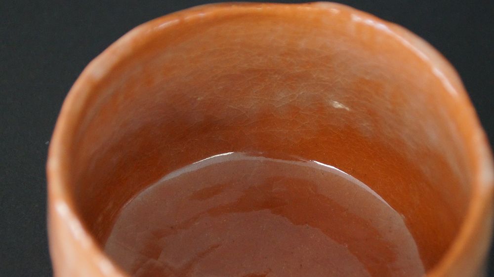 Close-up of the crackled interior glaze of the chawan tea bowl made of Raku ware