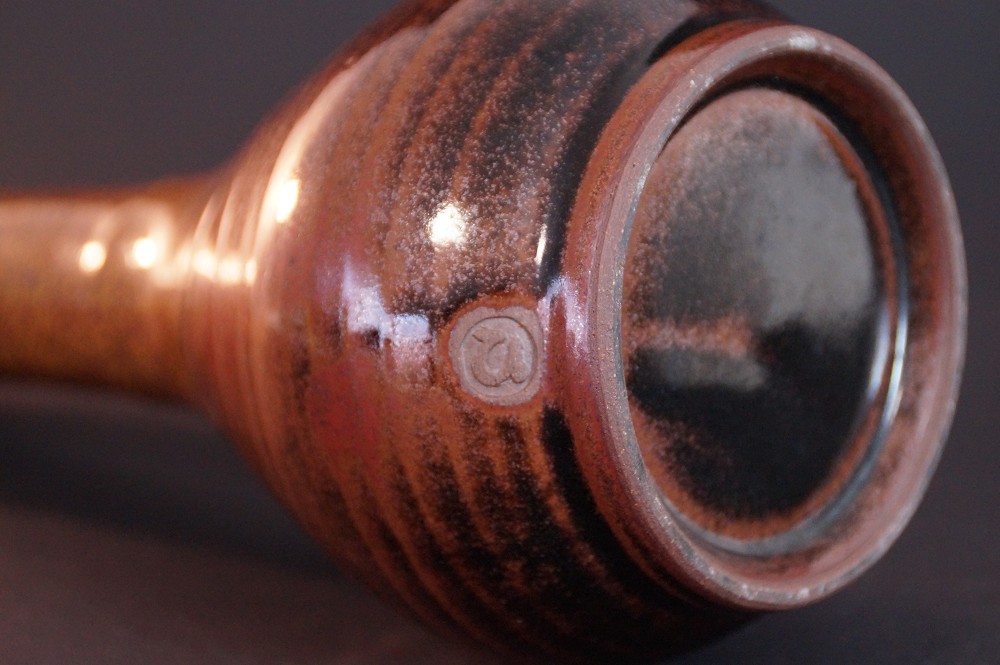 Close-up of the foot with stamped potter's mark