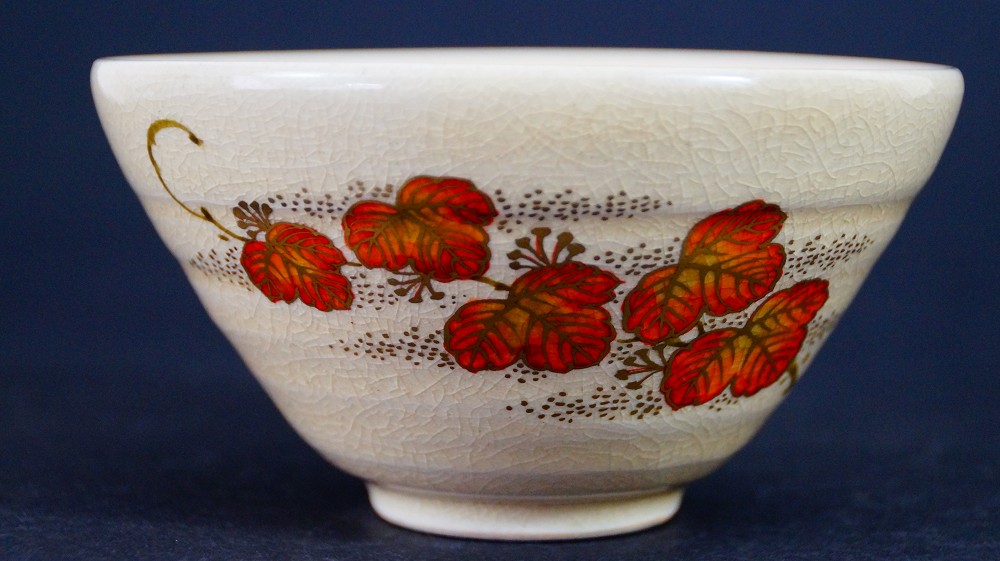 Additional side view of the chawan made of Satsuma ware by Gyokusen Nozaki with the maple leaf motif