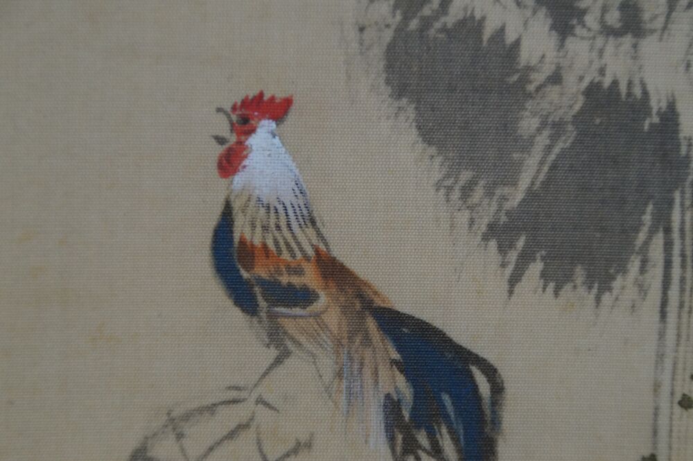 Close-up of the rooster's head with red comb in the Kakemono Rooster and Plum Blossoms
