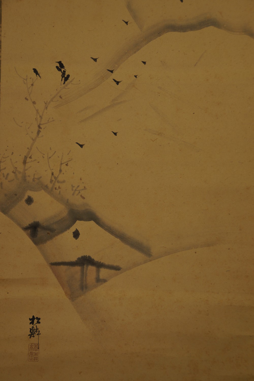 Close-Up of the Crows in the Tree above the Snow-Covered Roofs with Signature