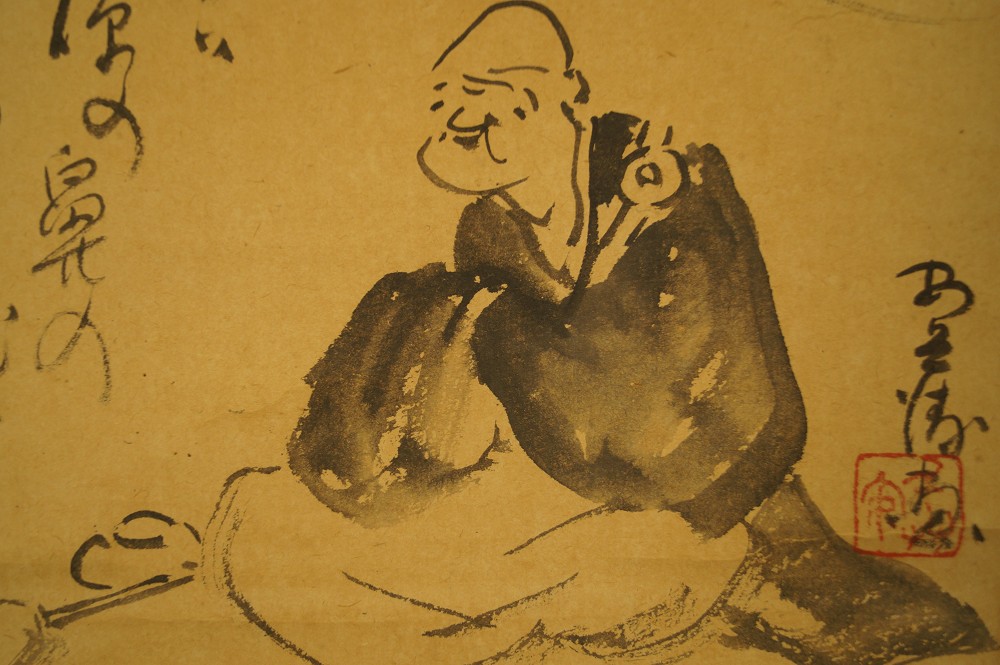 Old Zen monk under cherry blossoms Bodhidharma motif close-up