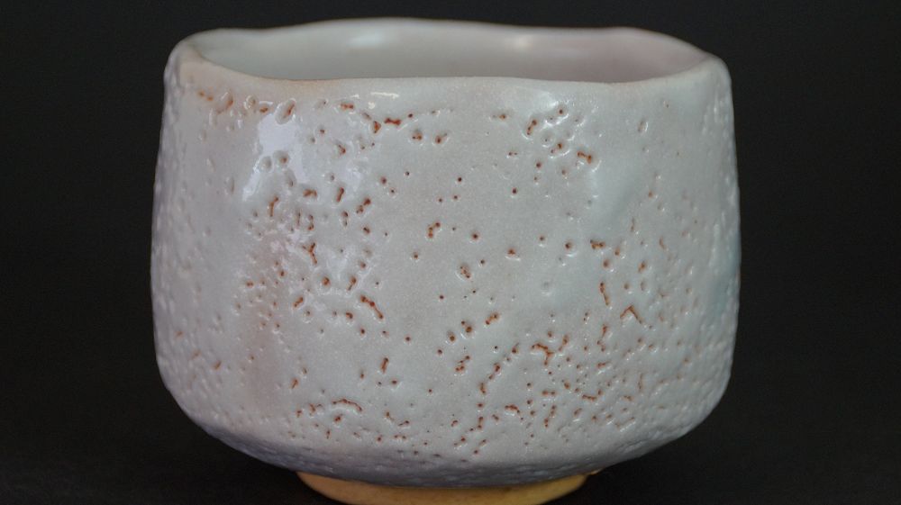 Further view of the chawan made of Shino ware with delicate pink glaze