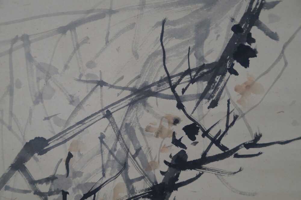 Further close-up of the branch structure with scattered autumn leaves in the hanging scroll Raven on Bare Branch by Watanabe Ando