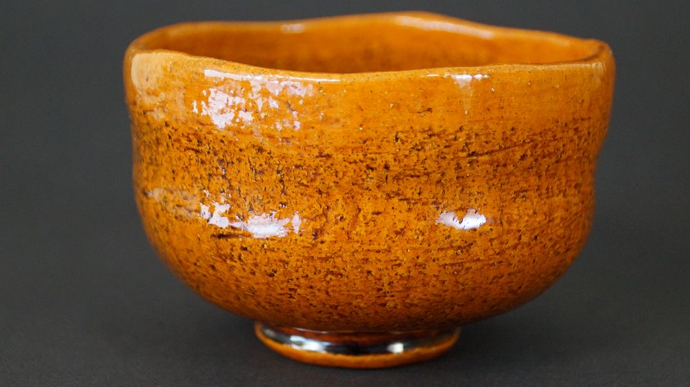Additional View of the Chawan Tea Bowl Made of Ohi Ware From the Side