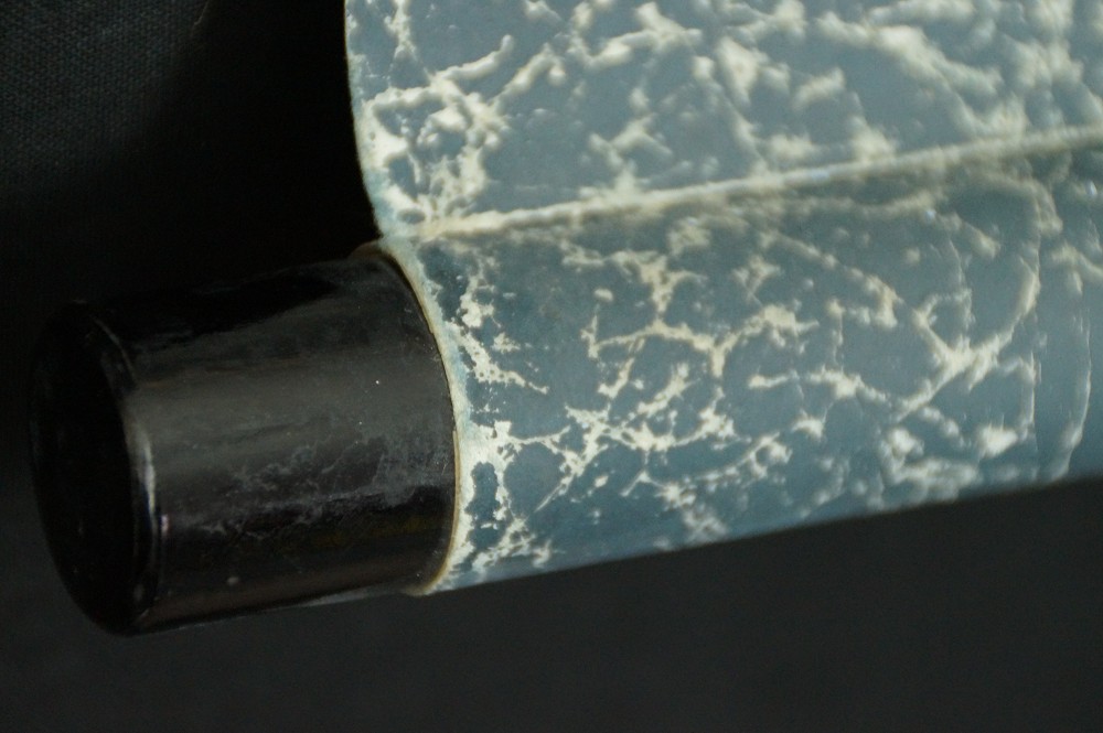 Close-Up of the Black Lacquered Scroll End with Crackled Front Fabric Border